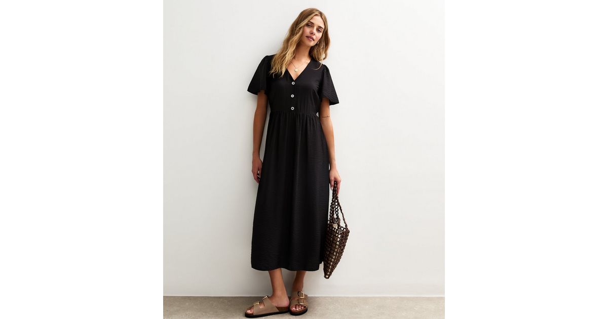 flutter sleeve linen button front midi dress By Anthropologie Flutter-sleeve Linen Button-front Midi Dress In Black