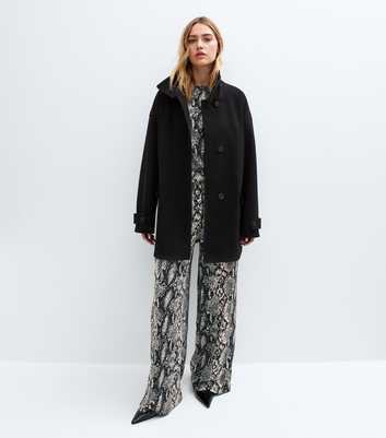 Off White Soft Touch Snake Print Trousers