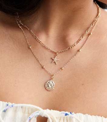 Gold Tone Multi-Row Starfish Disc Necklace