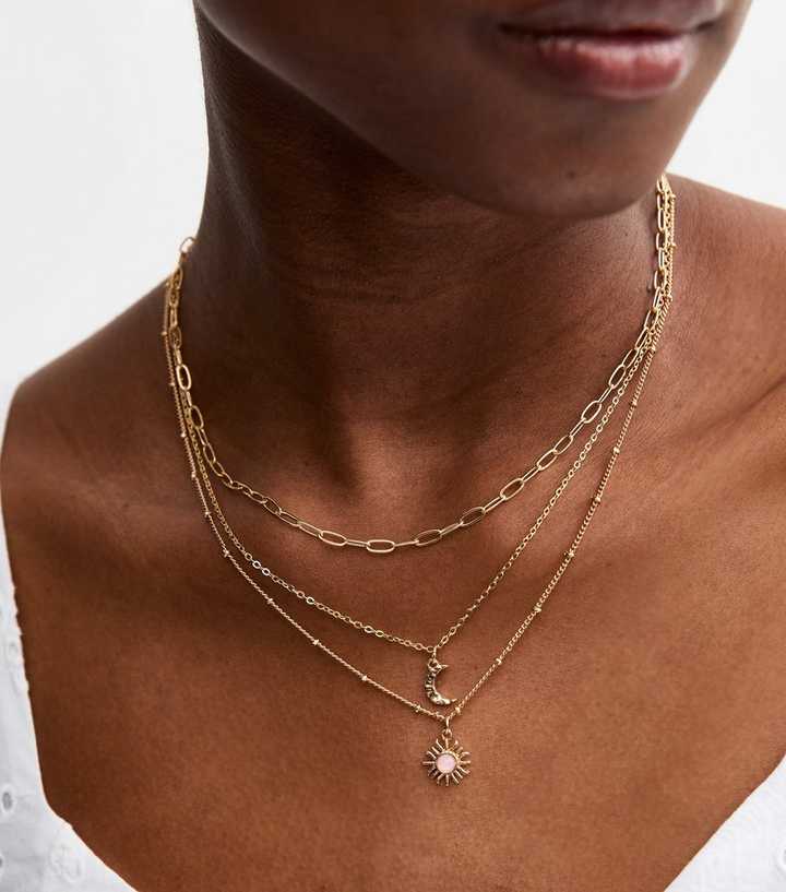 Gold Tone Sun and Moon Necklace