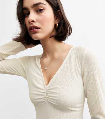 Cream Textured V-Neck Top