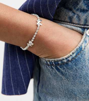 Silver Tone Cross Charm Diamanté Tennis Bracelet