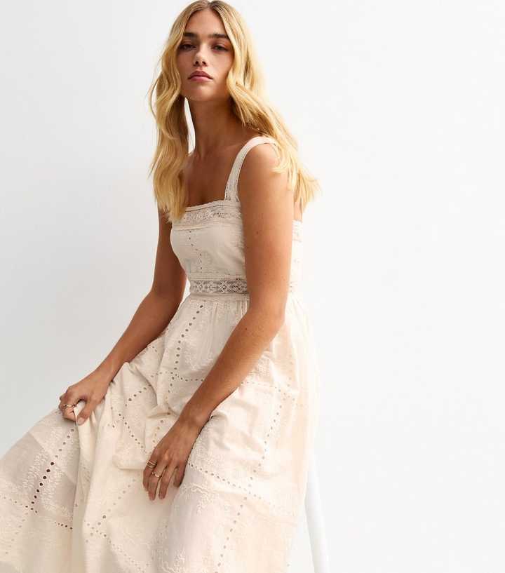 white christmas dresses Zimmermann Jeannie Cutout Broderie Anglaise Midi Dress Cream Linen Siz –  Celebrity Owned main image 1