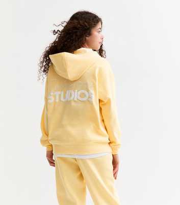 Girls Yellow Sports 1996 Studios Embroidered Hoodie