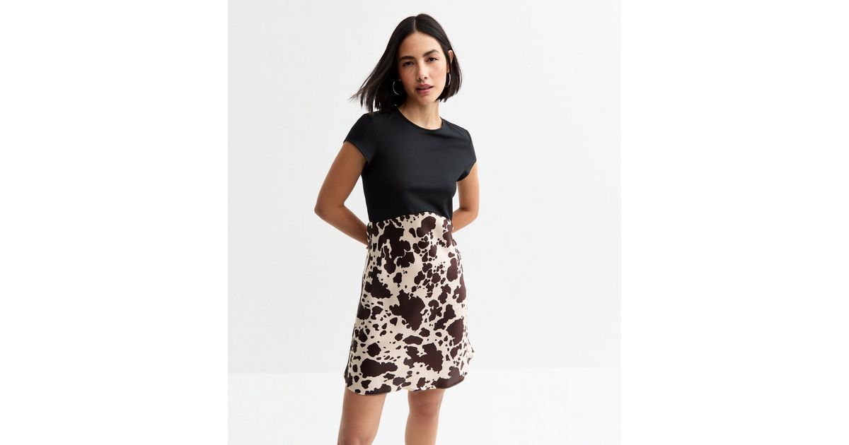 Grazing The Trend Cow Print Lace-Up Mini Dress