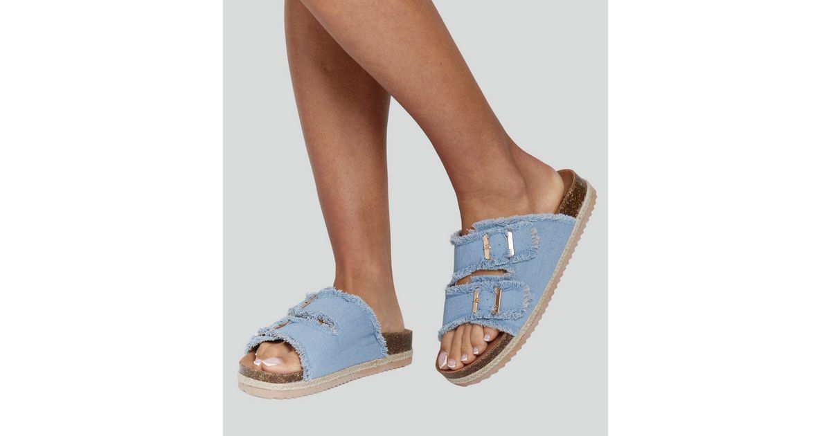 Feminine buckle strap sandal fringed denim main image 1
