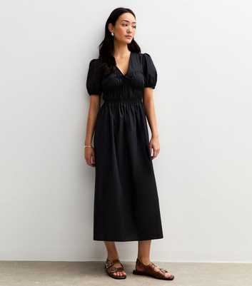 Black V Neck Shirred Bodice Bow Front Midi Dress