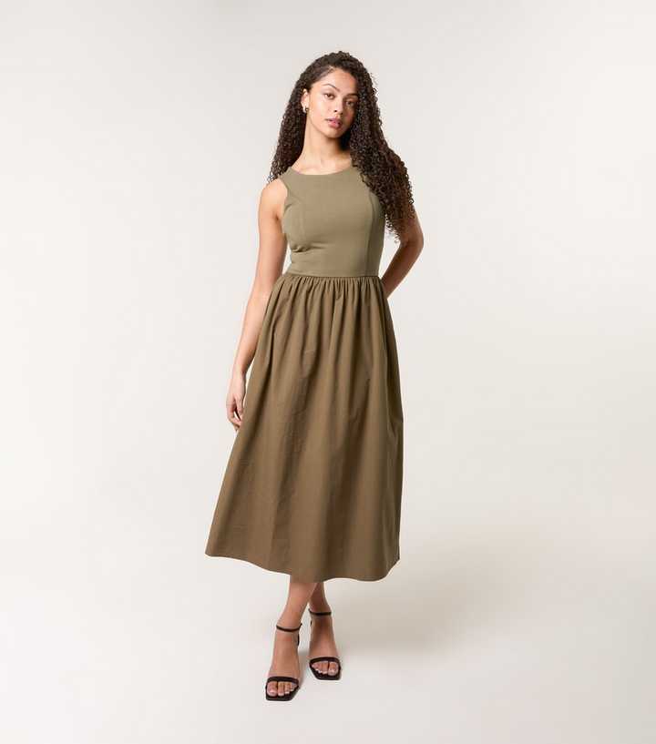 jersey poplin midi dress Black Cotton Jersey & Poplin Midi Dress by Vasstram at Pernia's Pop Up Shop 2026