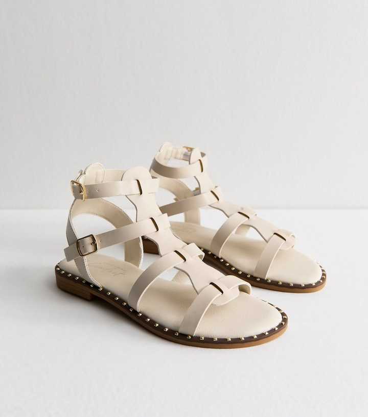 Off White Faux Leather Studded Trim Gladiator Strap Sandals