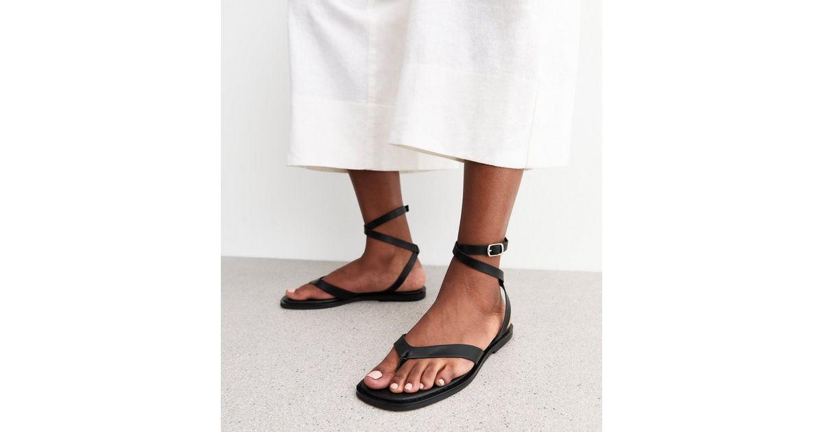 Black Faux Leather Thong Strap Ankle Wrap Flat Sandals New Look