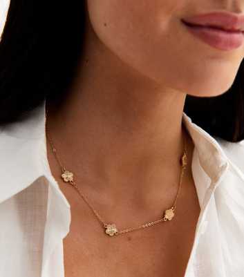 Gold Tone Textured Flower Charm Necklace