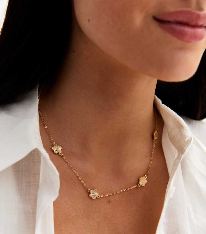 Gold Tone Textured Flower Charm Necklace