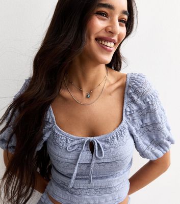 blue smocked top