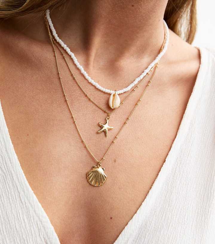 Gold Tone Triple Layer Shell Charm Necklace