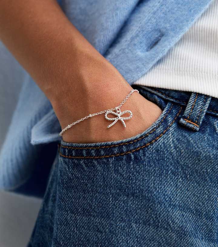Silver Tone Ribbed Textured Bow Bracelet