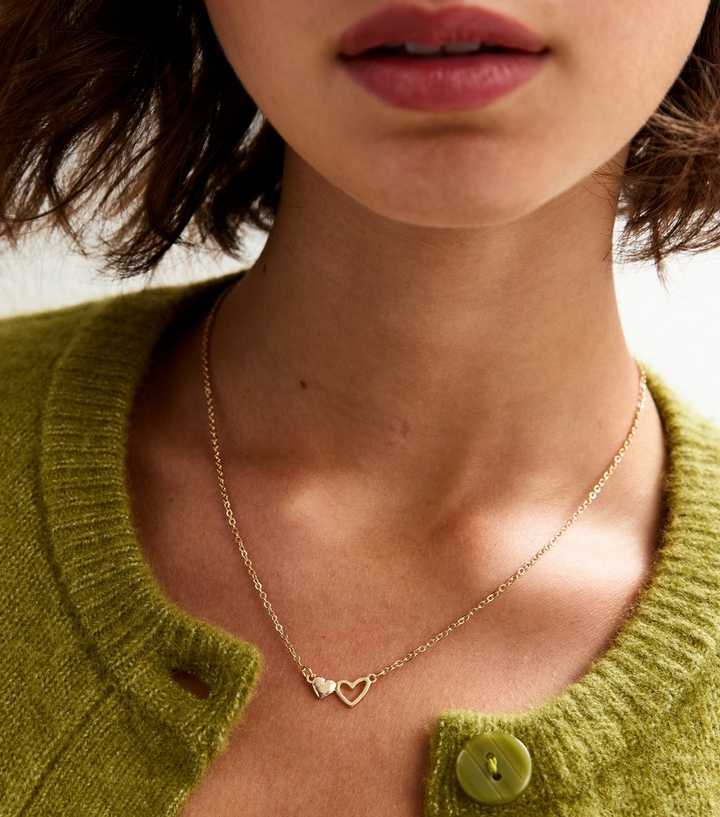 Gold Tone Cut Out Heart Pendant Necklace