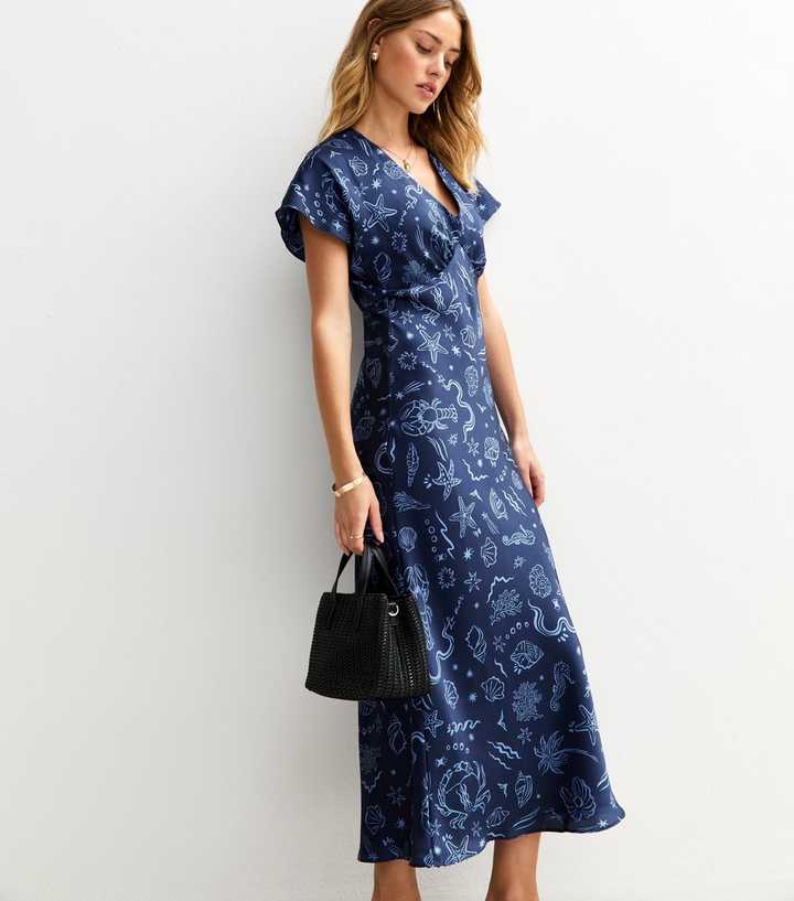 women's tulle midi dress Embroidered Sheer Tulle Midi Dress by Tony Ward – Elilhaam