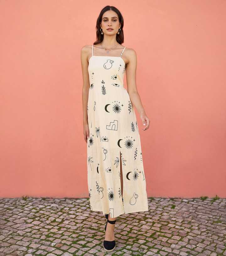 Yumi Off White Printed Midi Dress