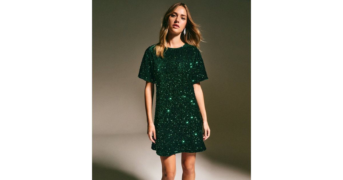 green emerald velvet dress Hunter Green Velvet Samantha Dress main image 0