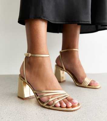 Gold Asymmetric Strap Heeled Sandals
