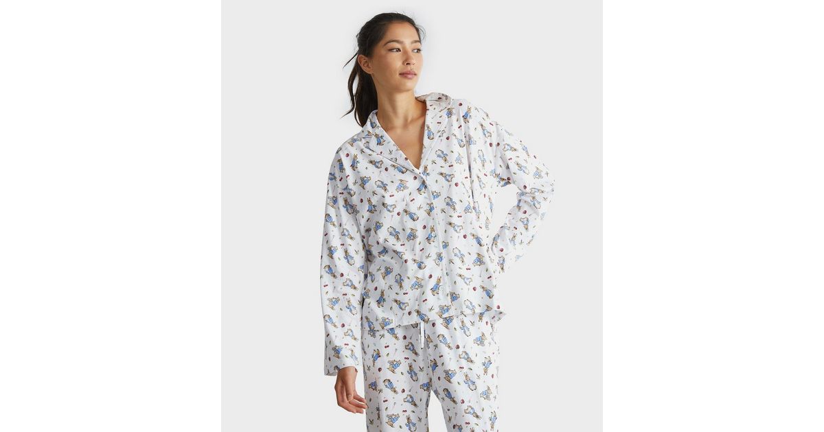 Cream The Rabbit Pyjamas Skinnydip Cream Peter Rabbit Shirt and Trousers Pyjama Set | New Look