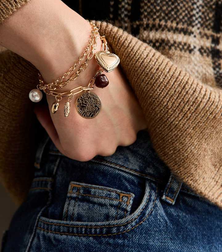 Gold Tone Three Row Multi Charm Bracelet