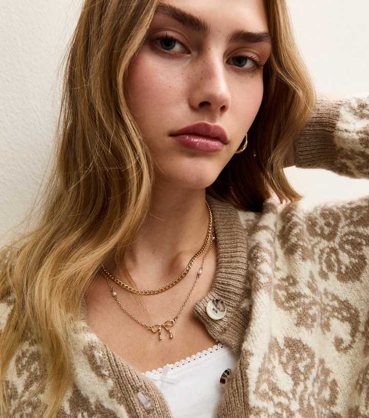 Gold Tone Layered Bow Pendant Necklace
