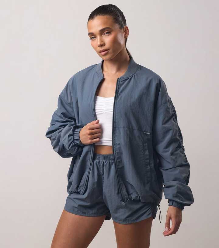 Gym King Blue Ruched Bomber Jacket 