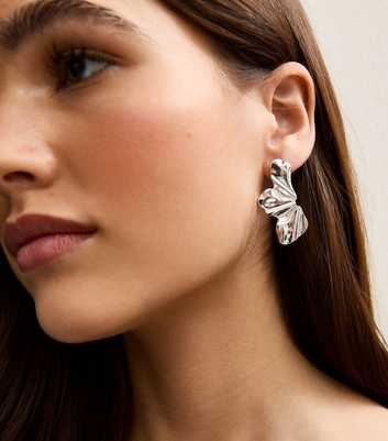 Silver Tone Half Petal Stud Earrings