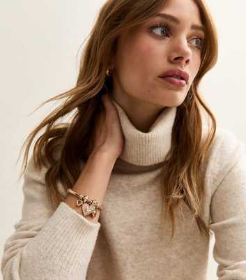 Gold Tone Multi Charm Bracelet