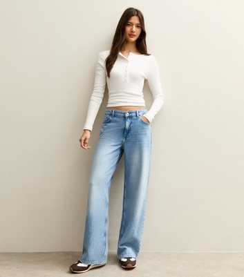 Mid Blue Low Rise Wide Leg Jeans