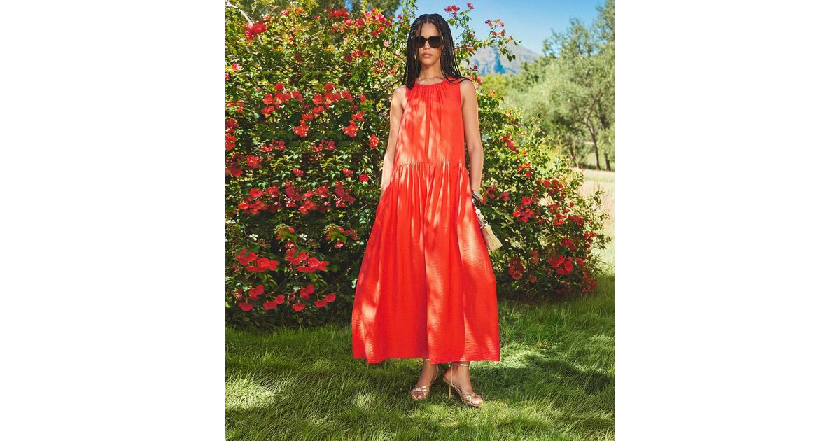 orange drop waist midi dress Orange Embroidered V-Neck Short Pom Sleeve Midi Dress main image 0