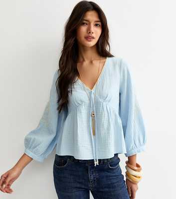 Light Blue Embroidered Sleeve Tea Blouse