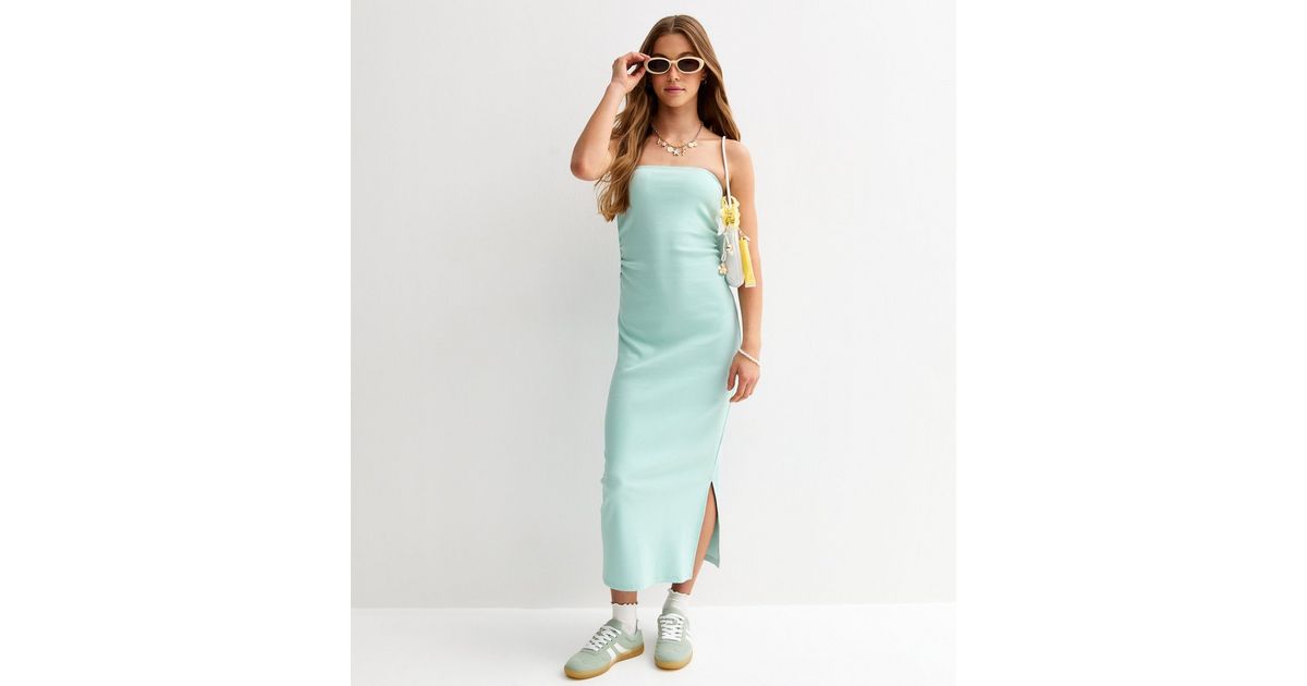 jersey and tulle dress Tulle dress with semi-transparent skirt and short jersey trousers – SWING