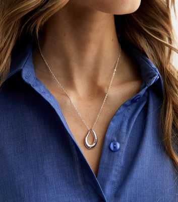 Silver Tone Abstract Oval Pendant Necklace