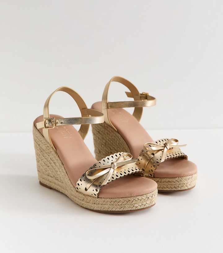 Gold Faux Leather Threaded Bow Wedge Sandals