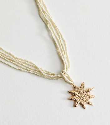 Cream Beaded Beaten Sun Pendant Necklace
