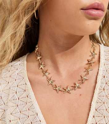 Gold Tone Textured Starfish Necklace