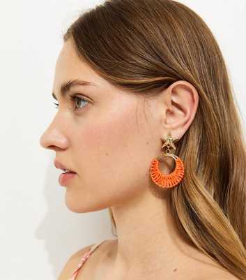 Gold Tone Light Coral Starfish Drop Earrings