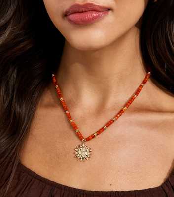 Orange Beaded Sun Pendant Necklace