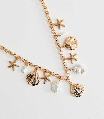 Gold Tone Faux Pearl Shell Charm Necklace