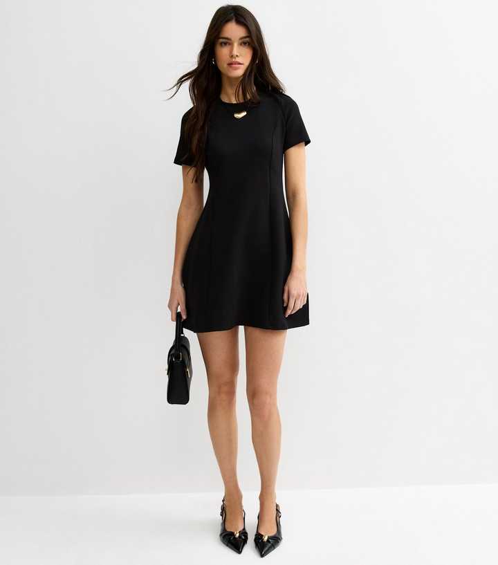 knee length dresses for ladies Berrylush Women Solid Black Crepe Bodycon Fit & Flare Mini Dress