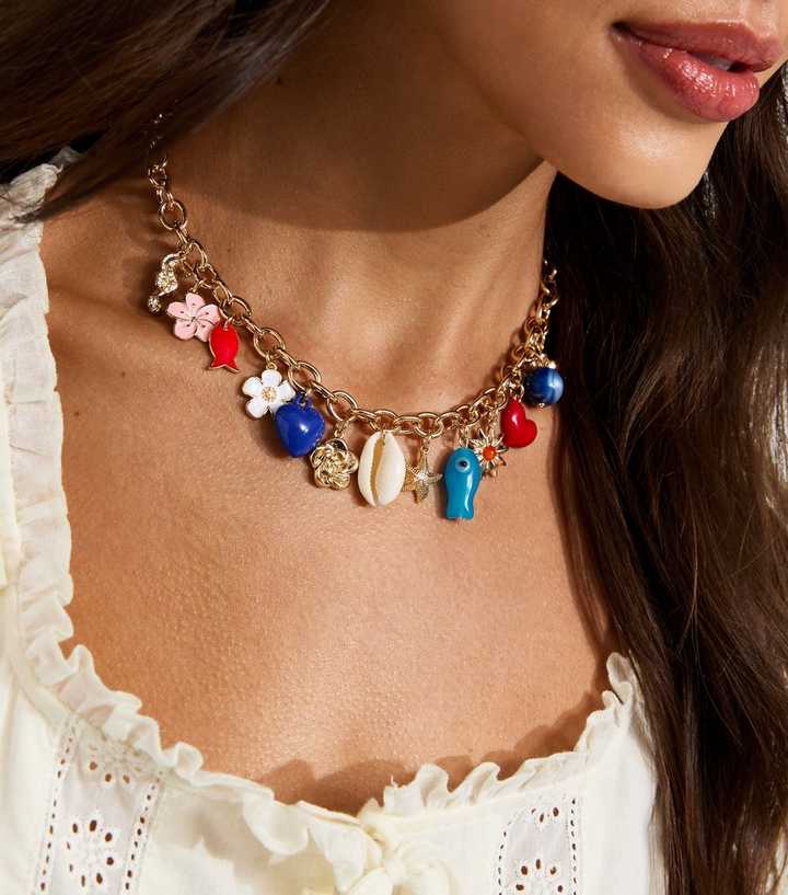 Gold Tone Flower Heart Charm Necklace