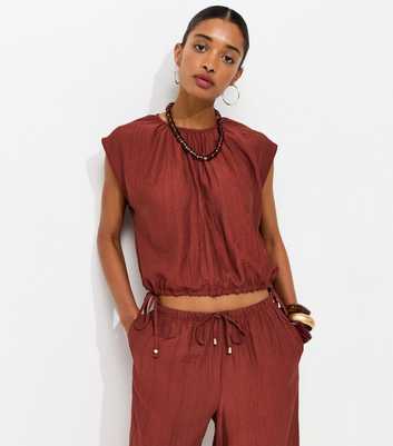 Rust Crinkle Texture Cap Sleeve Bubble Hem Top