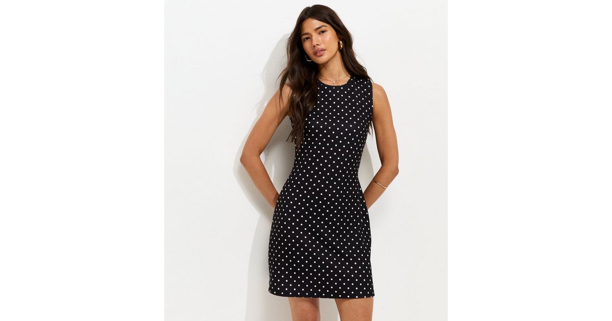 Black Polka Dot Tie Back Mini Dress | New Look