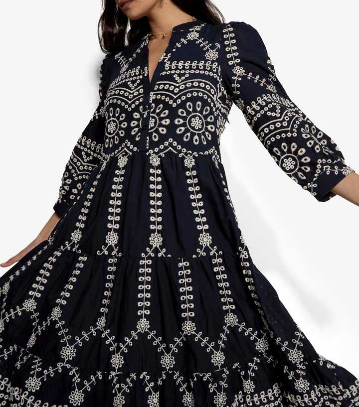 embroidered tiered midi dress Zimmermann Black Contrast Embroidery Tiered Midi Dress main image 0