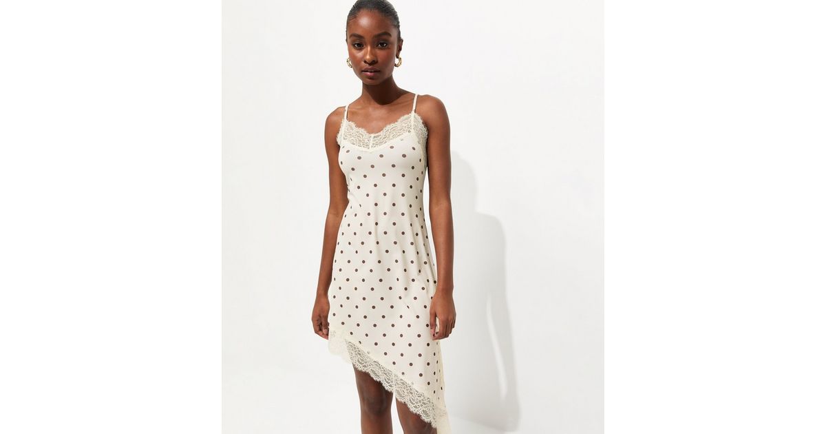 White Polka Dot Asymmetric Hem Mini Dress | New Look