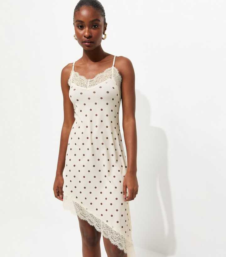 White Polka Dot Asymmetric Hem Mini Dress