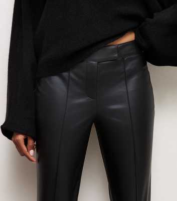 Petite Black Faux Leather Kick Flare Trousers