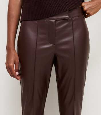 Petite Dark Brown Faux Leather Kick Flare Trousers